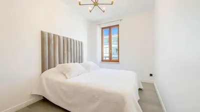 Un ou plusieurs lits dans un hébergement de l'établissement Le Riviera by Winsome Destination