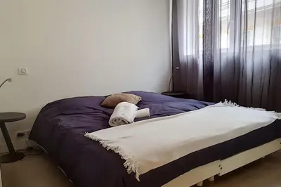 Un ou plusieurs lits dans un hébergement de l'établissement Sublime Apartment Center Croisette LIVE IN Moliere