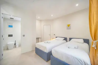 Un ou plusieurs lits dans un hébergement de l'établissement Moderne 2 chambres, CARRE D'OR- COEUR DE CANNES A2B194