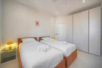 Un ou plusieurs lits dans un hébergement de l'établissement Moderne 2 chambres, CARRE D'OR- COEUR DE CANNES A2B194