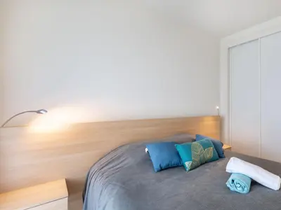 Un ou plusieurs lits dans un hébergement de l'établissement Apartment Cristal Croisette-4 by Interhome