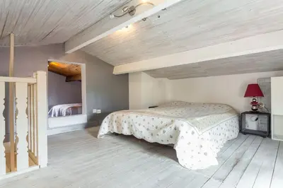 Un ou plusieurs lits dans un hébergement de l'établissement Grand Appartement (Haut de villa) proche de la mer