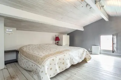 Un ou plusieurs lits dans un hébergement de l'établissement Grand Appartement (Haut de villa) proche de la mer