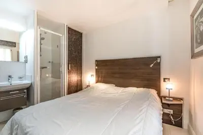 Un ou plusieurs lits dans un hébergement de l'établissement Croisette: 2BDR Apartment