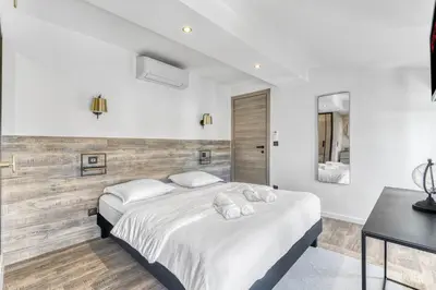 Un ou plusieurs lits dans un hébergement de l'établissement Magnifique 3 pièces centre de Cannes proche palais 