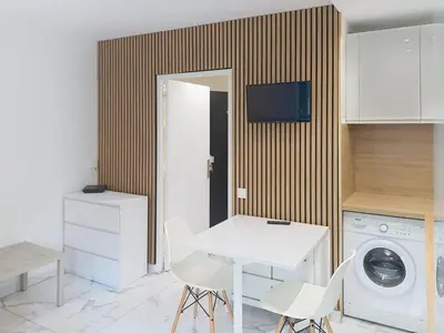 Cuisine ou kitchenette dans l'établissement Résidence Graziella Studio 102