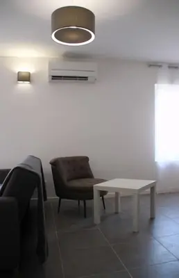 Coin salon dans l'établissement Appart dans maison 2 km de la plage