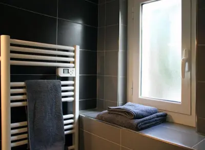 Un ou plusieurs lits dans un hébergement de l'établissement Appart dans maison 2 km de la plage