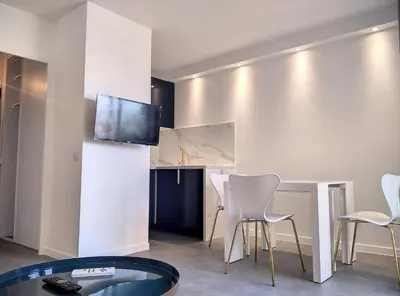 Cuisine ou kitchenette dans l'établissement Résidence Graziella Studio 411