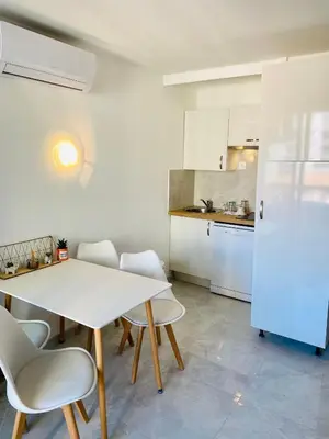 Cuisine ou kitchenette dans l'établissement Résidence Graziella Studio 424