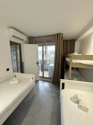 Un ou plusieurs lits dans un hébergement de l'établissement Résidence Graziella Appartement 222