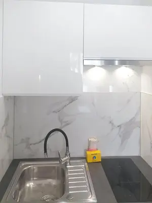 Cuisine ou kitchenette dans l'établissement Résidence Graziella Studio 502
