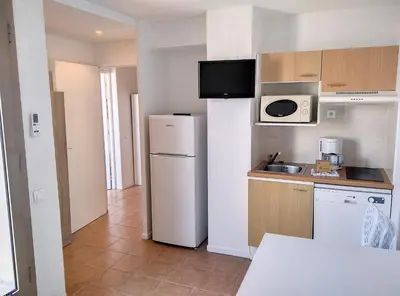 Cuisine ou kitchenette dans l'établissement Résidence Graziella Appartement 627