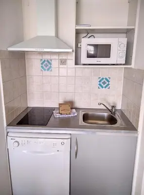 Cuisine ou kitchenette dans l'établissement Résidence Graziella Appartement 522