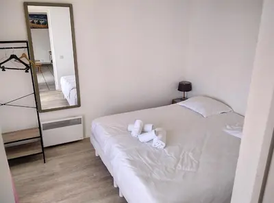 Un ou plusieurs lits dans un hébergement de l'établissement Résidence Graziella Appartement 522