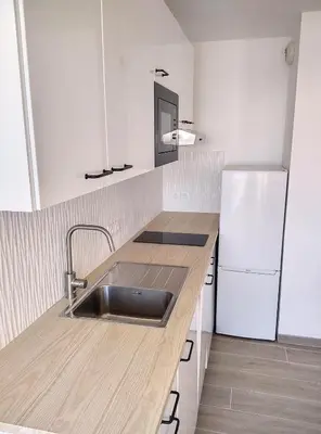 Cuisine ou kitchenette dans l'établissement Résidence Graziella Appartement 510