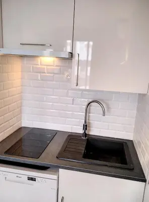 Cuisine ou kitchenette dans l'établissement Résidence Graziella Studio 507