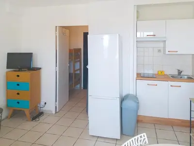 Cuisine ou kitchenette dans l'établissement Résidence Graziella Studio 423