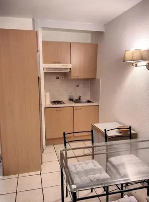 Cuisine ou kitchenette dans l'établissement Résidence Graziella Studio 526