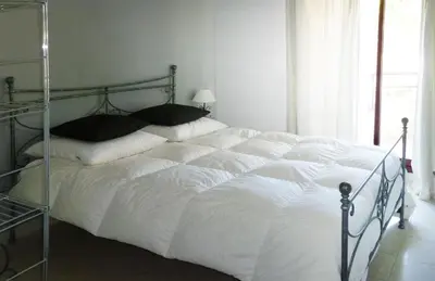 Un ou plusieurs lits dans un hébergement de l'établissement VILLAS DES LYS