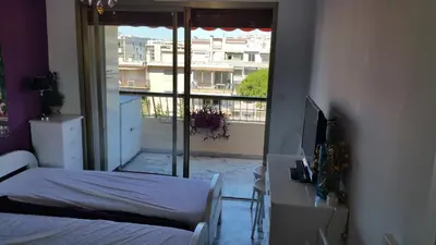 Un ou plusieurs lits dans un hébergement de l'établissement Moderne Appartement Cannes Californie
