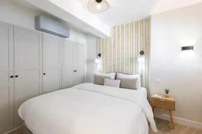 Un ou plusieurs lits dans un hébergement de l'établissement Martinez area Superb 1 bed w XXL terrace