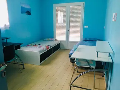 Un ou plusieurs lits dans un hébergement de l'établissement VILLA MAYANNE JUAN LES PINS