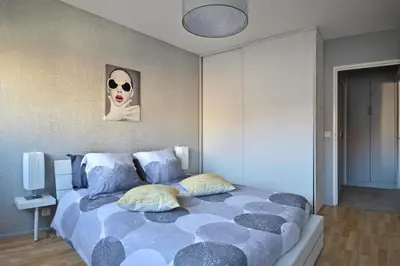 Un ou plusieurs lits dans un hébergement de l'établissement Appartement cœur de juan les pins