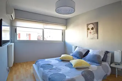 Un ou plusieurs lits dans un hébergement de l'établissement Appartement cœur de juan les pins
