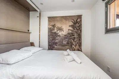 Un ou plusieurs lits dans un hébergement de l'établissement Appartement Nicilia - Welkeys