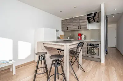 Cuisine ou kitchenette dans l'établissement Appartement Nicilia - Welkeys