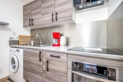 Cuisine ou kitchenette dans l'établissement Appartement Nicilia - Welkeys