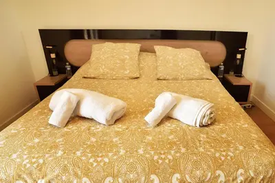 Un ou plusieurs lits dans un hébergement de l'établissement La Villa d’Emma