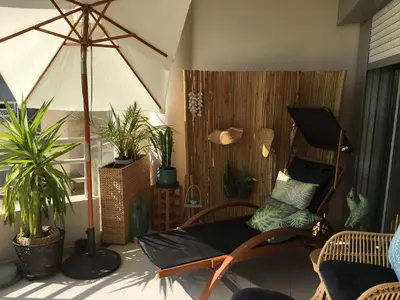 Coin salon dans l'établissement Appartement tout confort vue mer