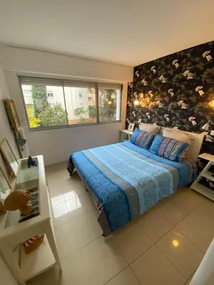 Un ou plusieurs lits dans un hébergement de l'établissement Grand appartement de style avec parking - Cannes