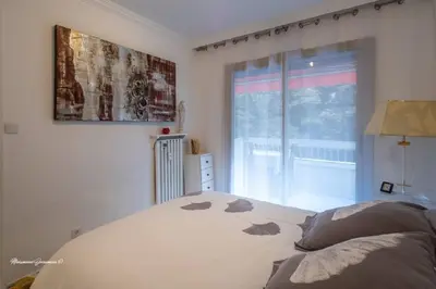 Un ou plusieurs lits dans un hébergement de l'établissement Ô 27 Fleurie Cannes