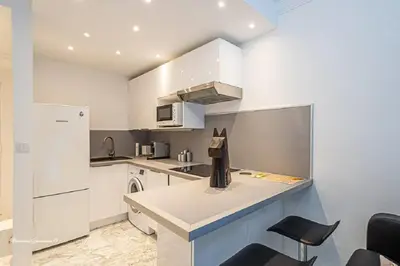 Cuisine ou kitchenette dans l'établissement Ô 27 Fleurie Cannes