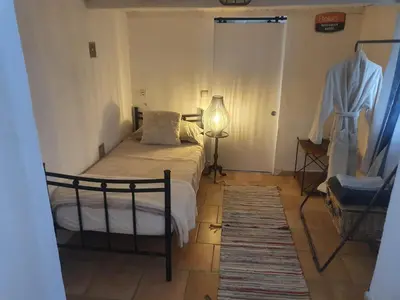 Un ou plusieurs lits dans un hébergement de l'établissement Villa Acacia