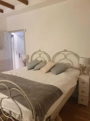 Un ou plusieurs lits dans un hébergement de l'établissement Villa Acacia