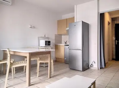Cuisine ou kitchenette dans l'établissement Résidence Graziella Studio 506