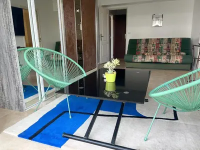 Coin salon dans l'établissement Cool Appart sur Croisette Palm Beach