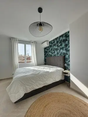Un ou plusieurs lits dans un hébergement de l'établissement AGENCIA appartement 2 Pièces lumineux terrasse