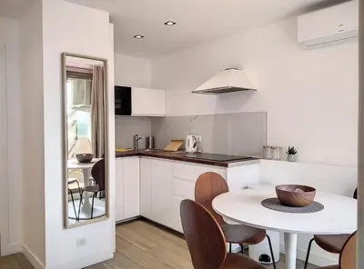 Cuisine ou kitchenette dans l'établissement Résidence Graziella Studio 511