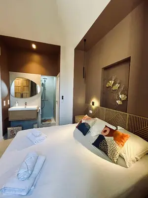 Un ou plusieurs lits dans un hébergement de l'établissement KOSY Spa, Les Princes