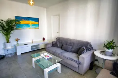 Coin salon dans l'établissement Ref SELV -Palmes d'Or Properties