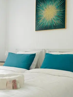 Un ou plusieurs lits dans un hébergement de l'établissement Le Cocon - 2 pièces centre Cannes - Terrasse