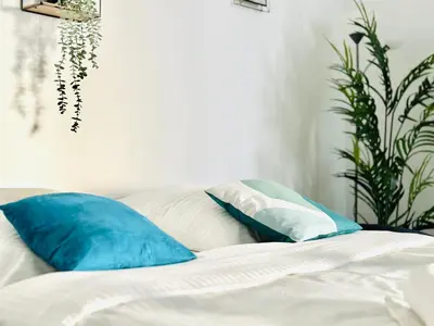 Un ou plusieurs lits dans un hébergement de l'établissement Le Cocon - 2 pièces centre Cannes - Terrasse