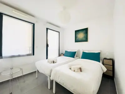 Un ou plusieurs lits dans un hébergement de l'établissement Le Cocon - 2 pièces centre Cannes - Terrasse