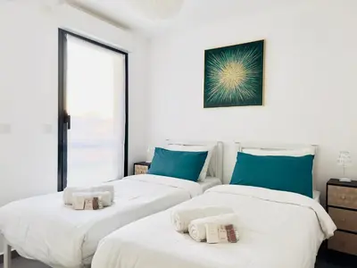 Un ou plusieurs lits dans un hébergement de l'établissement Le Cocon - 2 pièces centre Cannes - Terrasse