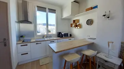 Cuisine ou kitchenette dans l'établissement Palais Gounod